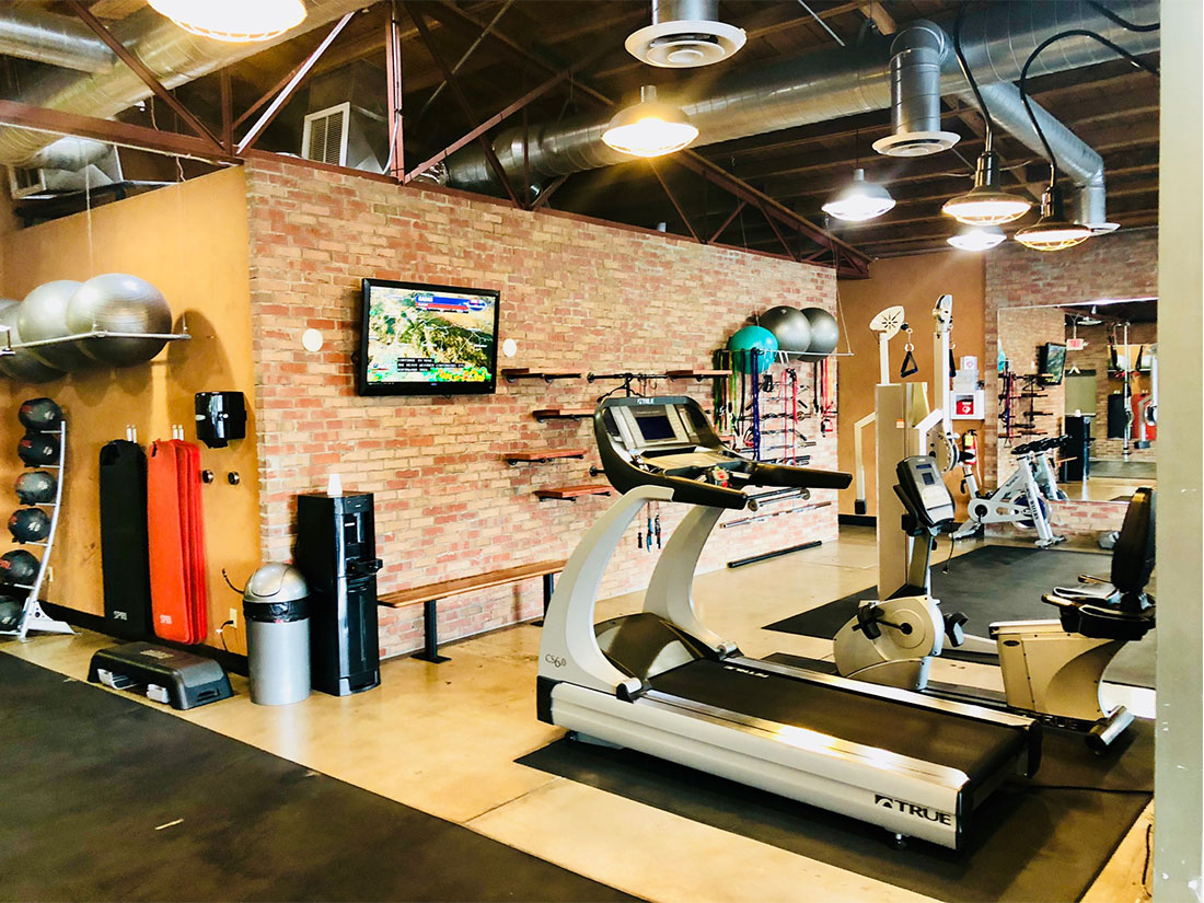 photo 10 of FIIT by Jason Smith facility showing a treadmill, recumbent bike, television, stability balls, medicine balls, rebok deck and more to maximize weight loss and muscle gain in Phoenix, AZ