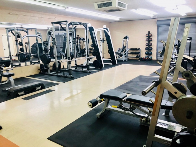 photo 7 of FIIT by Jason Smith showing rebok deck, bicep curl machine, bench press machine, leg curl machine, squat rack, medicine ball rack and more  so you can meet your fitness goal